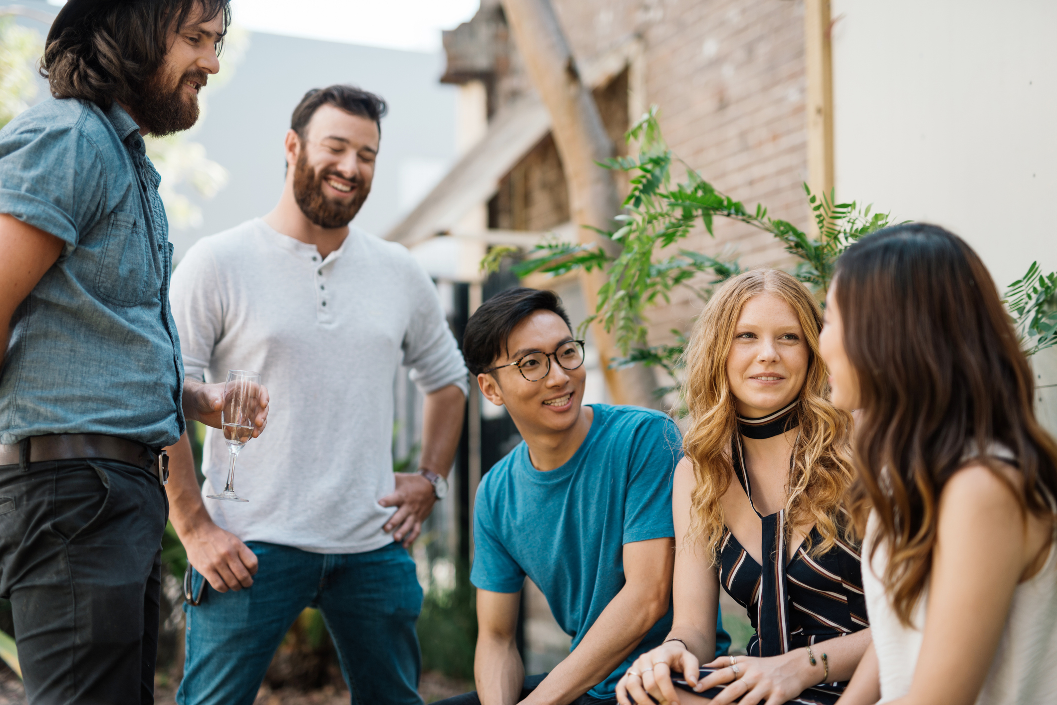 Multi ethnic group of beautiful people in Australian garden