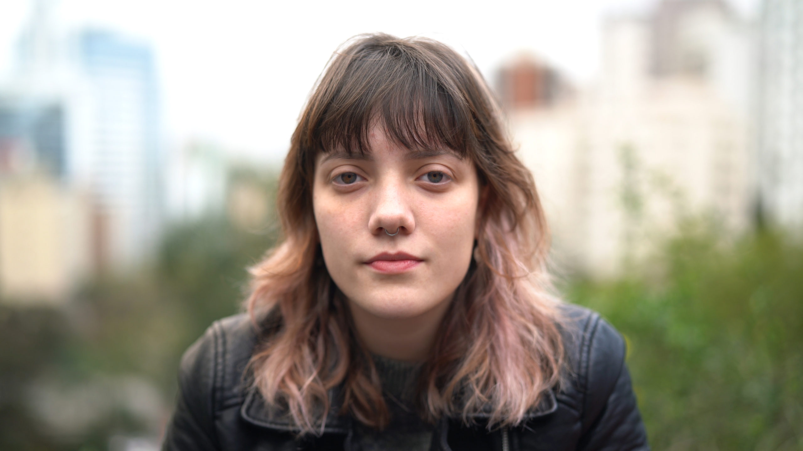 Young Hipster Woman Portrait at City